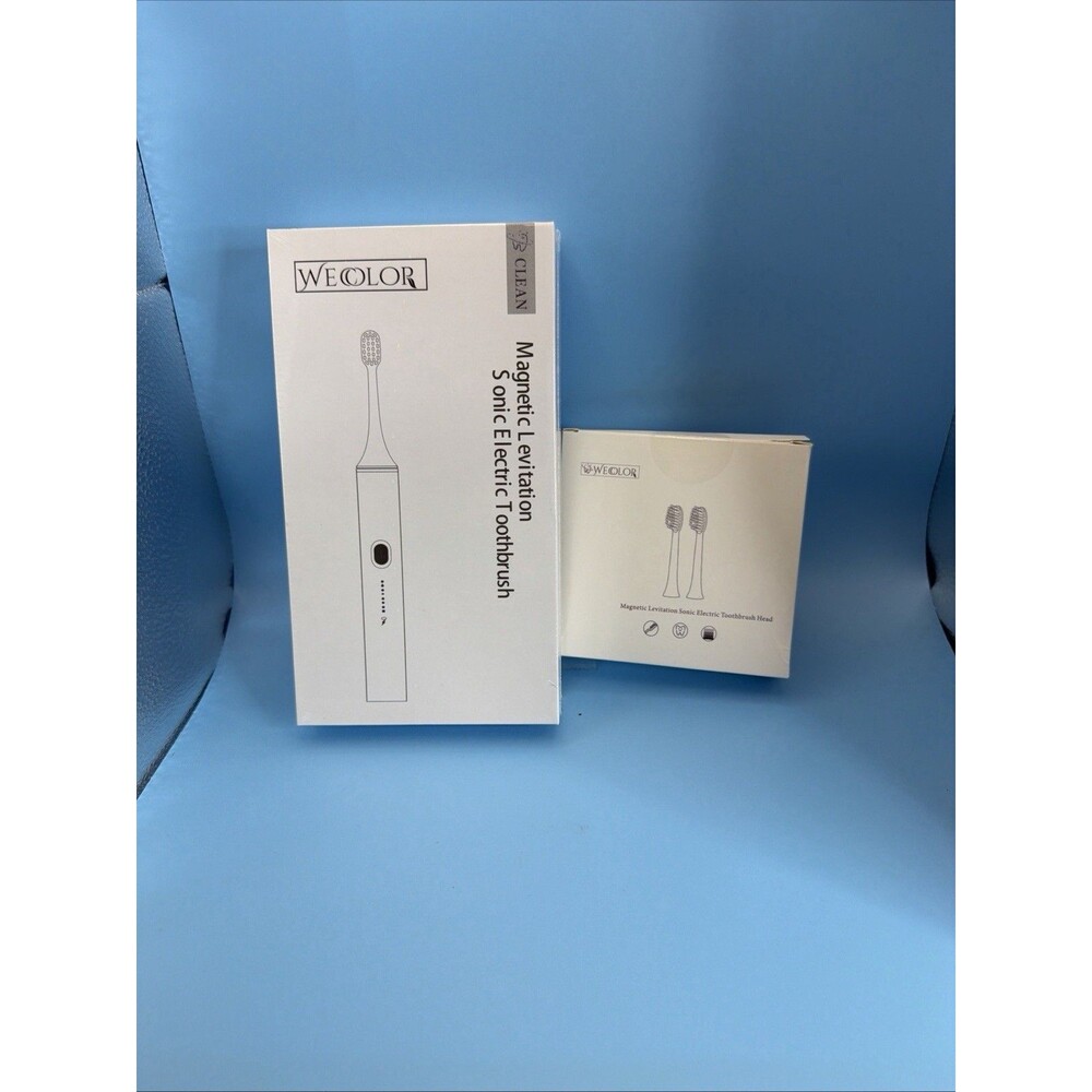 Wecolor Sonic Electric Toothbrush with 4 Replacement Heads. Color Green